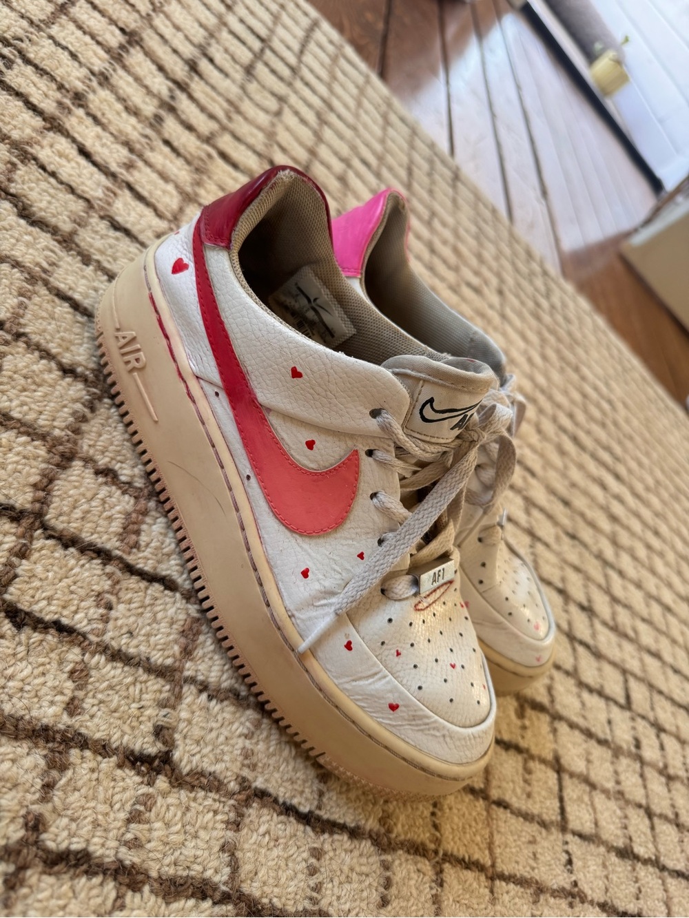 Nike White Sneakers with Pink Swoosh & Red Heart Accents